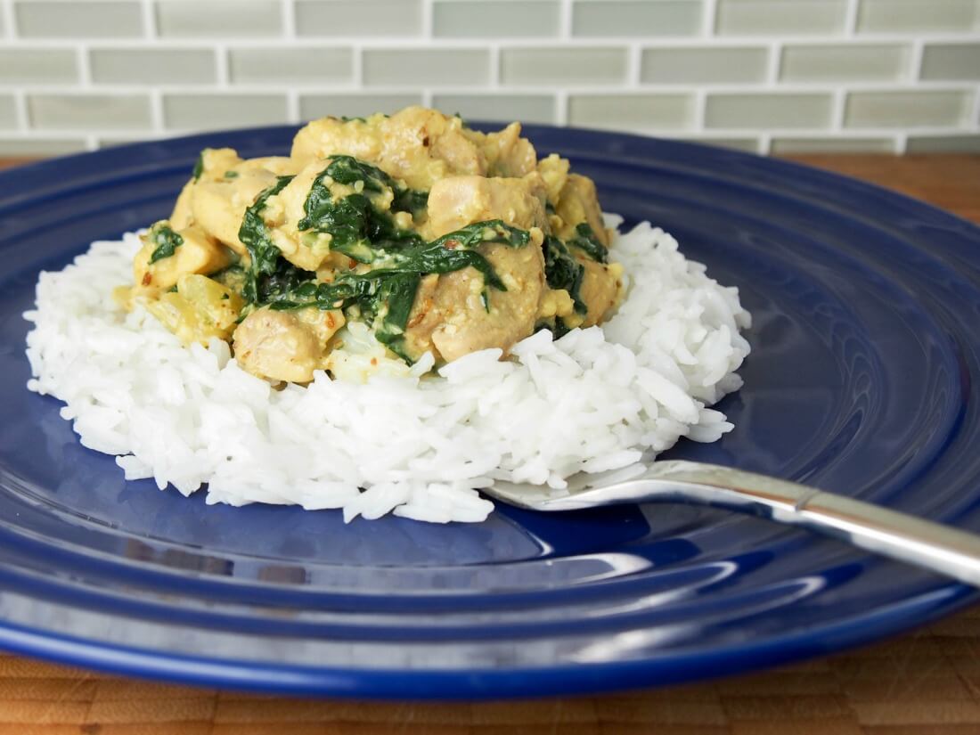 Fragrant chicken curry with chard, coconut and cashew