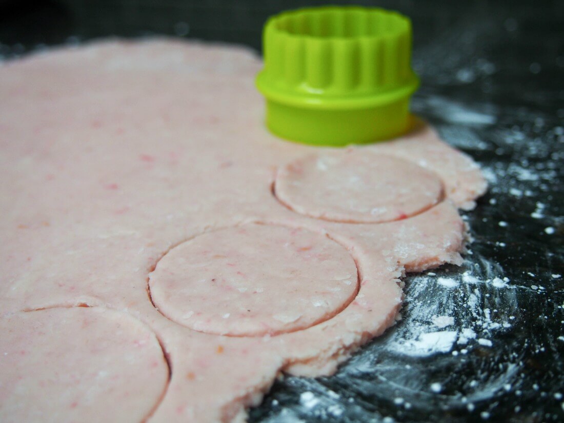 cutting raspberry shortbread love hearts