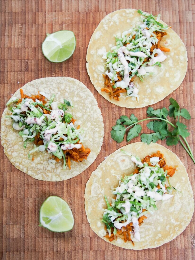 These sweet potato tacos are easy to make & thoroughly delicious.  Gently spiced sweet potato, a crunchy, zesty slaw & a kick from chipotle cream.  vegetarian