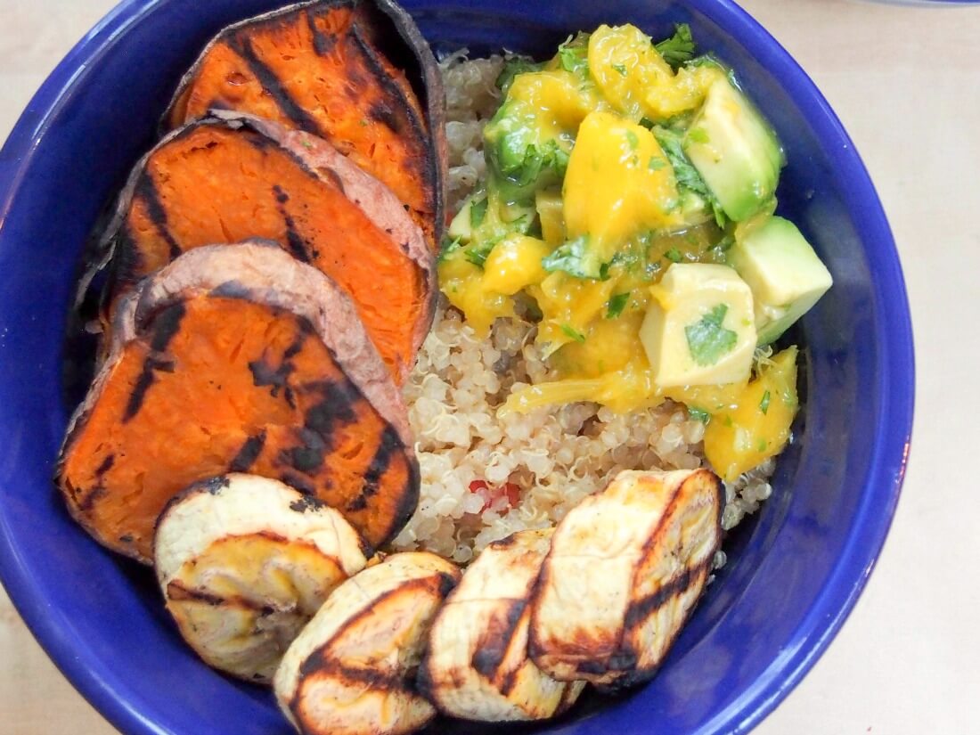 Cuban quinoa bowl with grilled sweet potato and plantain and avocado-mango salsa
