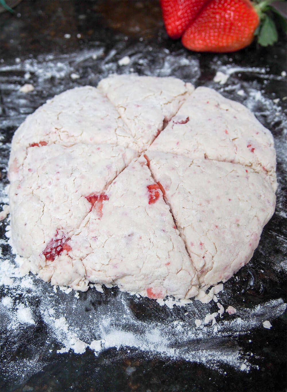 cutting strawberry scones with mascarpone cutting strawberry scones with mascarpone