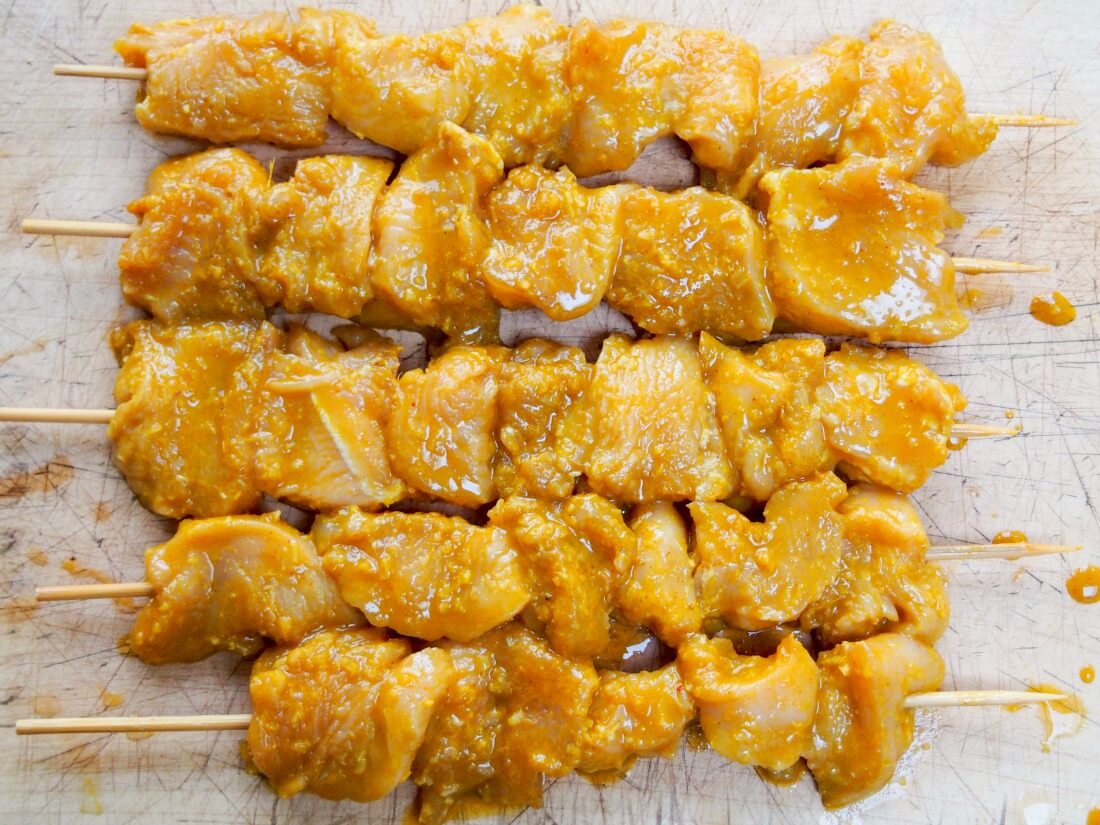 marinated chicken satay skewers ready to cook