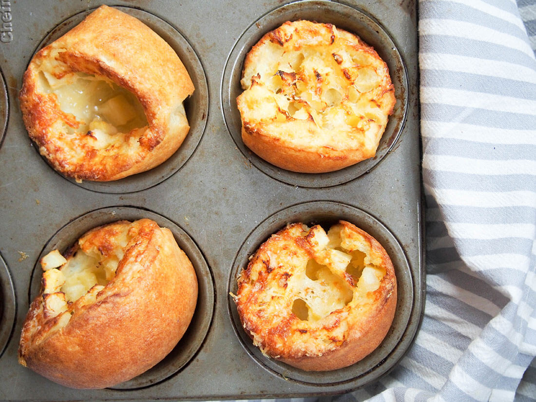 apple and cheddar cheese Yorkshire pudding in pan from above