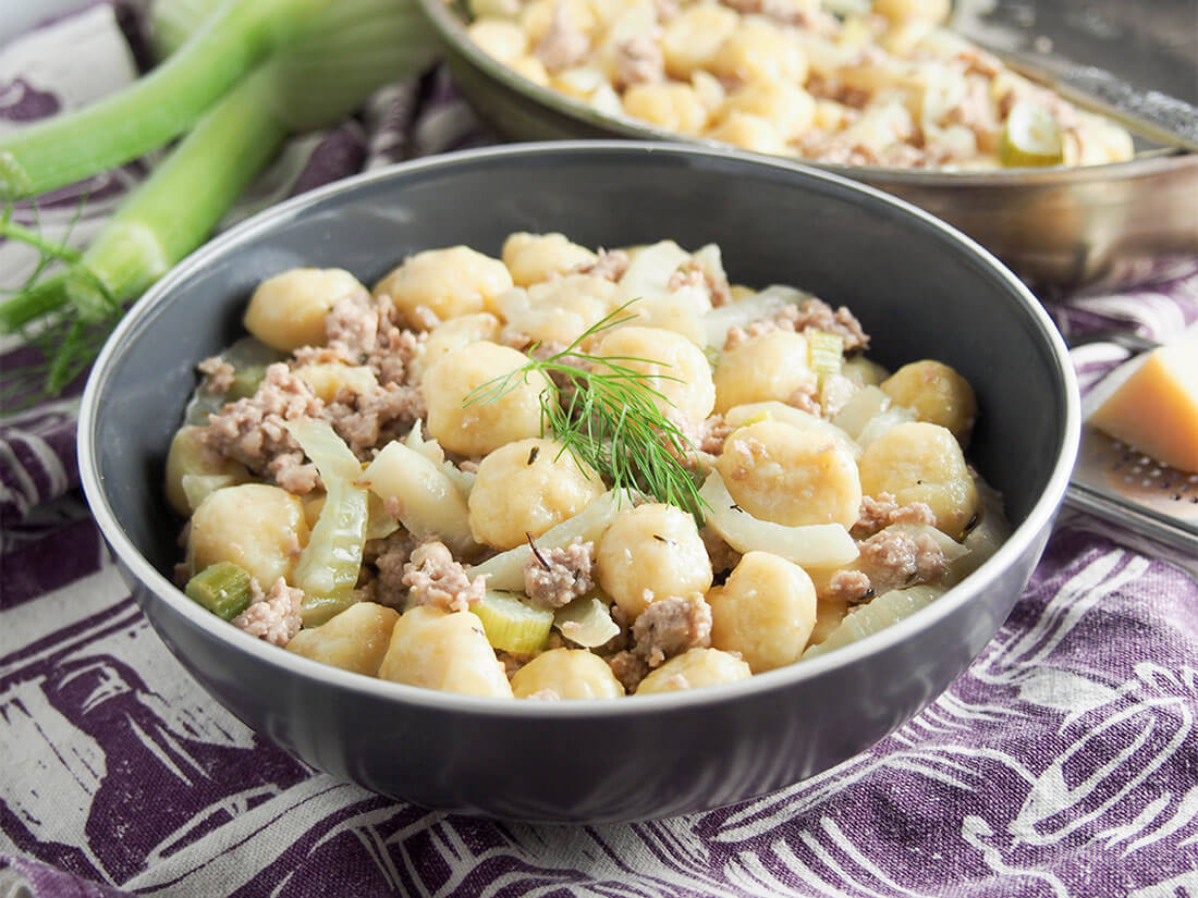 bowl of gnocchi with pork and fennel