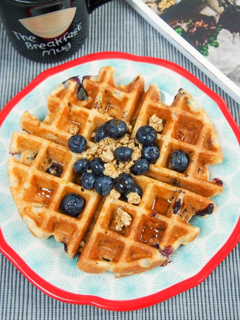 These blueberry granola waffles are a fantastic mix of flavors and textures- fruity, slightly chewy and with lots of wholegrains;  a great start to any day.  breakfast recipe