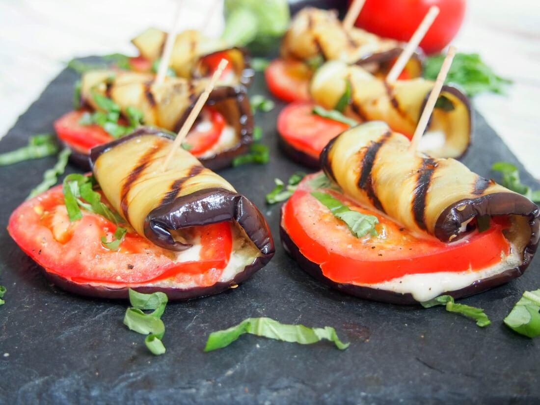 caprese grilled eggplant roll ups on platter ready to serve