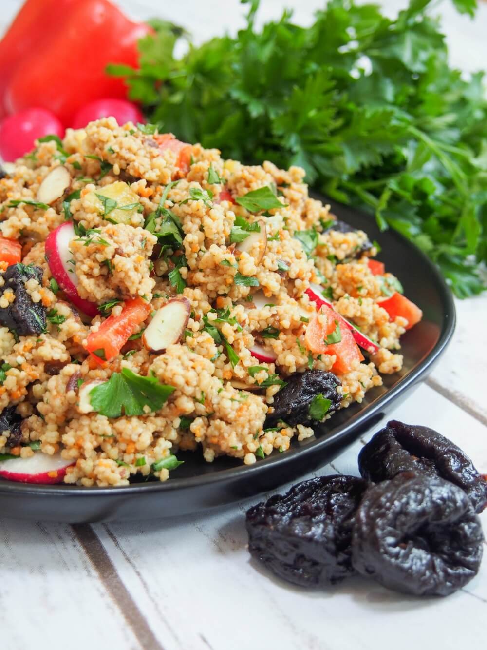 This couscous salad is packed with crunchy vegetables, a creamy prune vinaigrette, and is vegan too. Easy to make and great as a side, lunch or take it on a picnic.  This couscous salad is packed with crunchy vegetables, a creamy prune vinaigrette, and is vegan too. Easy to make and great as a side, lunch or take it on a picnic.