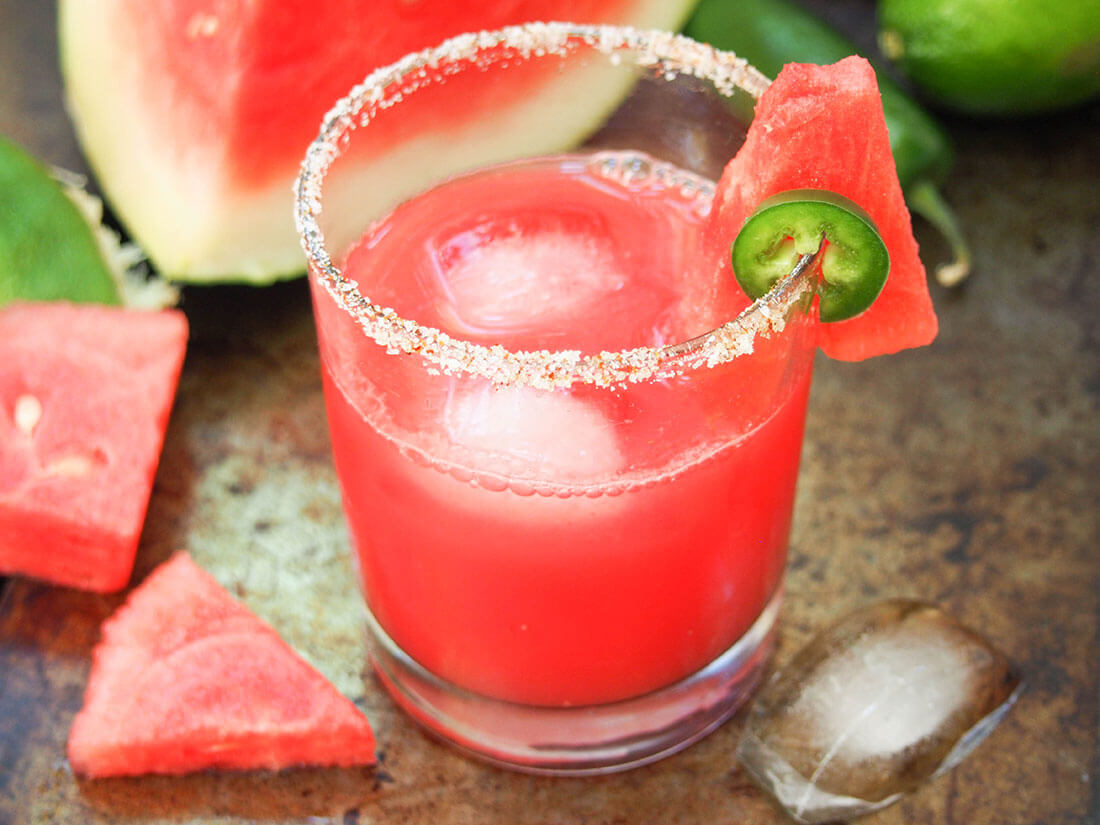 Spicy watermelon margarita with watermelon to side