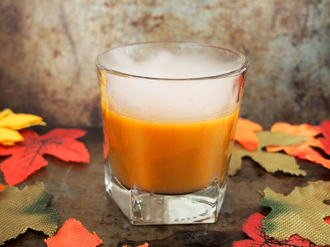 glass of falling for orange: amaro pumpkin cocktail