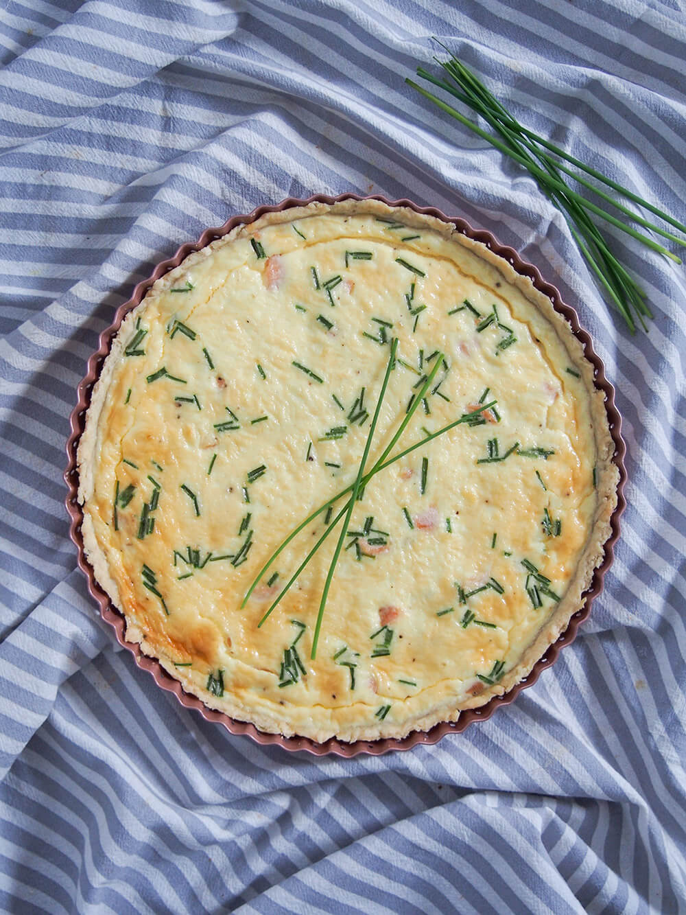whole smoked salmon quiche from overhead