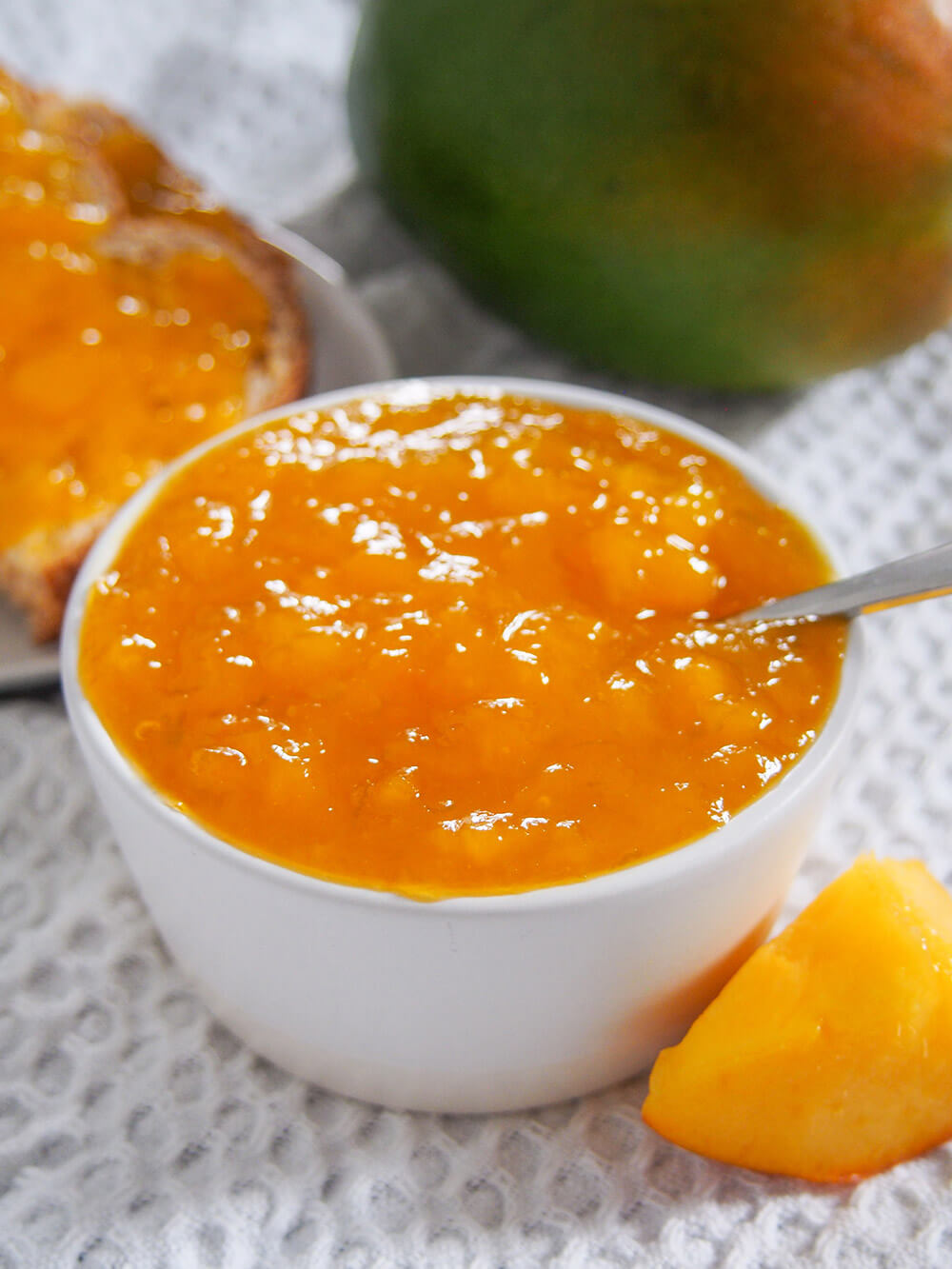 bowl of mango jam from side