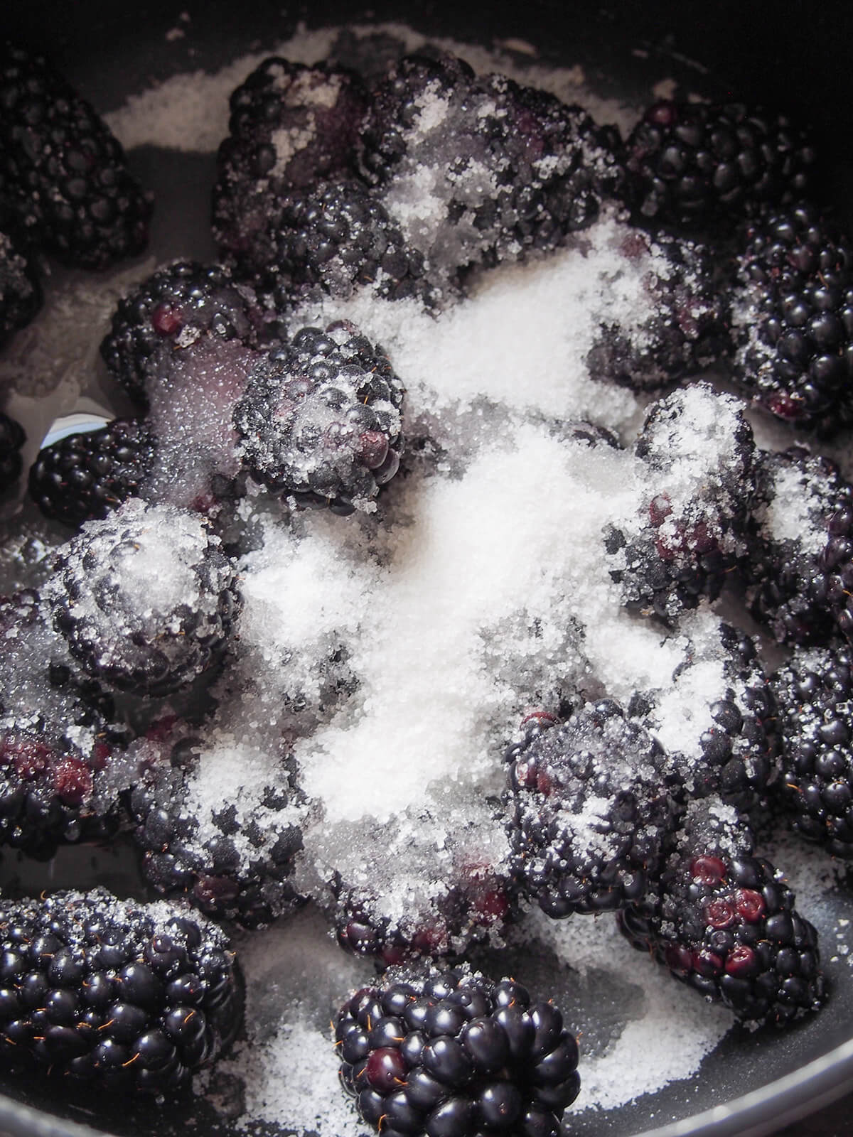 blackberries, sugar and lemon juice in pan