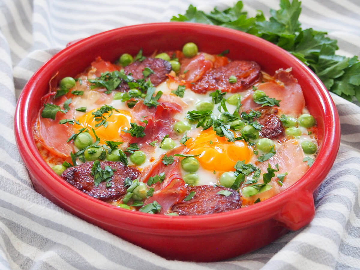 terracotta dish of flamenco eggs