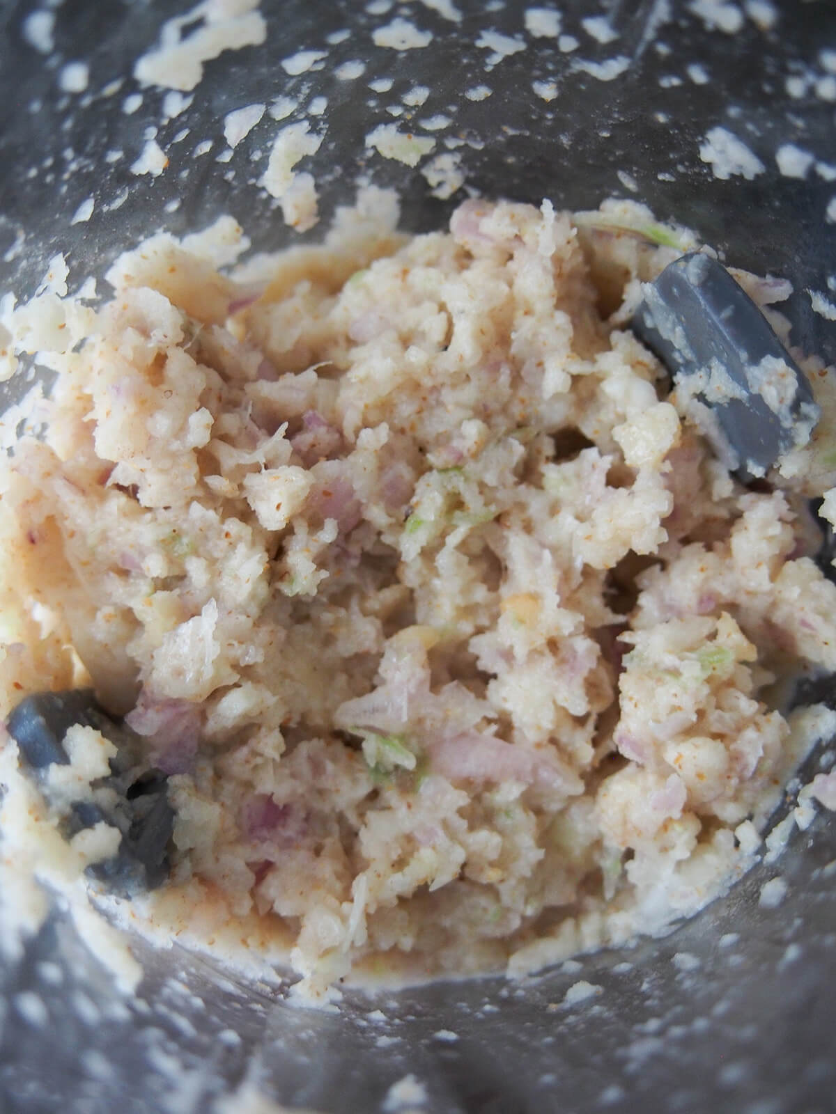 paste for opor ayam ground up paste of shallots, garlic, lemongrass and galangal in blender.