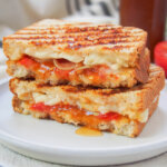 two halves of a braaibroodjie, S African grilled cheese close up.