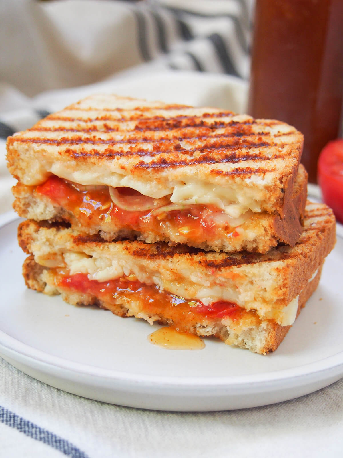 A braaibroodjie is a South African grilled cheese sandwich, made extra delicious with chutney and more inside. They are easy to make and so delicious. Traditionally, you cook over the barbecue/grill but you can also use a grill pan or panini press instead (even if it loses a little of that fire flavor). A braaibroodjie is a South African grilled cheese sandwich, made extra delicious with chutney and more inside. They are easy to make and so delicious. Traditionally, you cook over the barbecue/grill but you can also use a grill pan or panini press instead (even if it loses a little of that fire flavor).