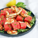 side close up view of plate of halloumi and watermelon salad.