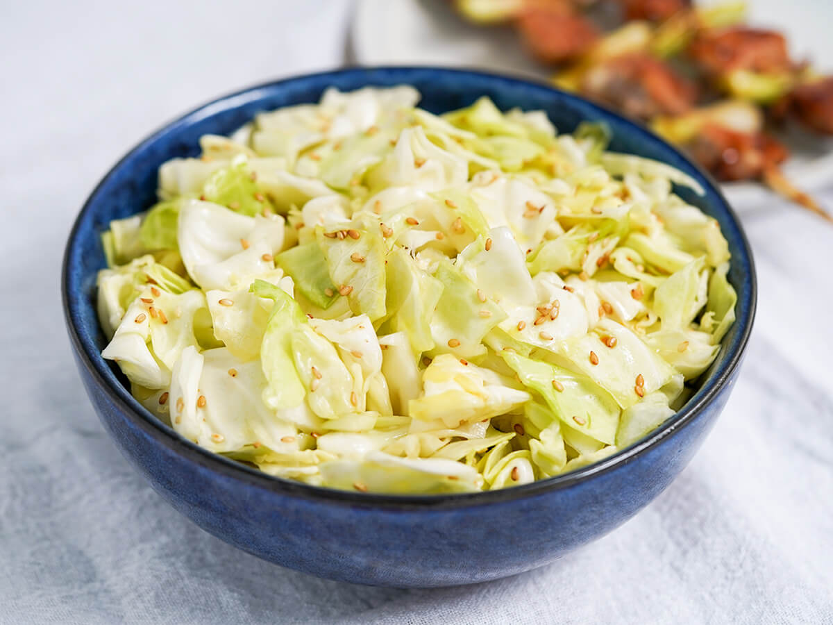 side view of bowl of Japanese cabbage salad (yamitsuki cabbage).
