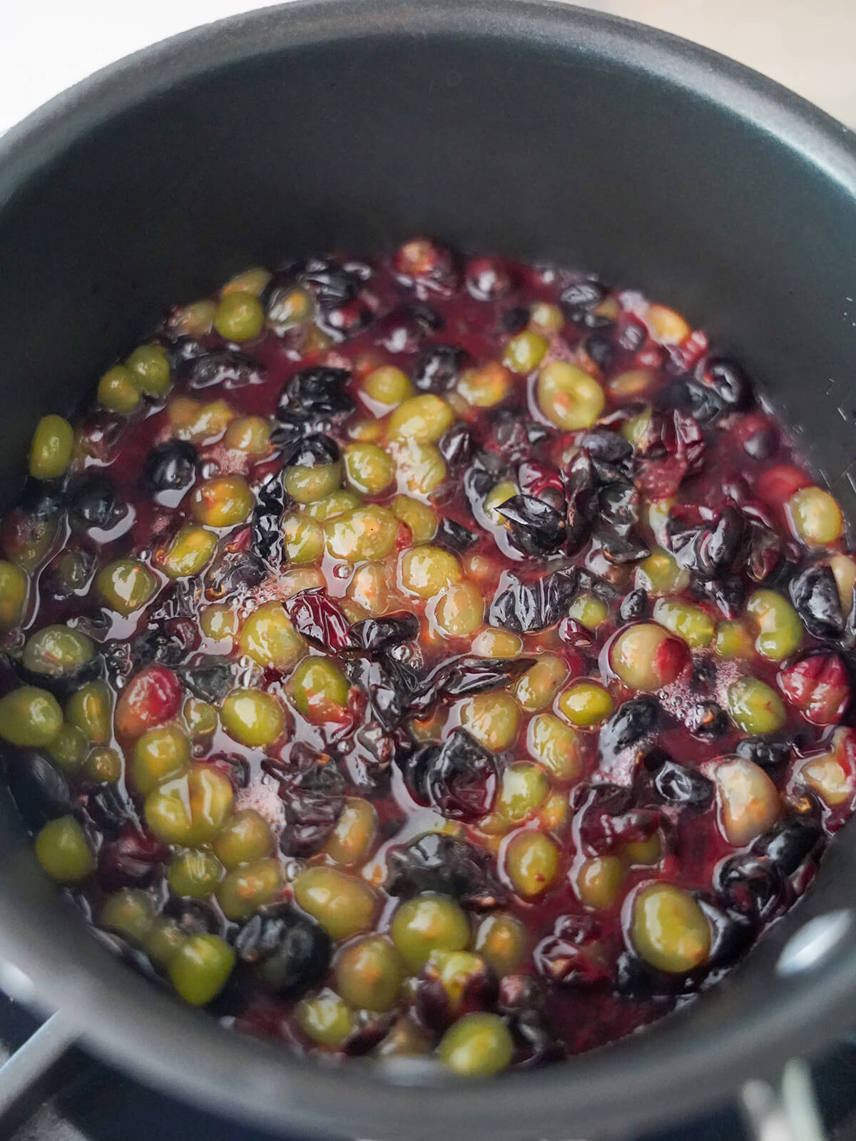 cooking grapes to make juice for grape gummy bears starting to cook grapes to make juice.