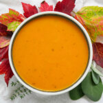 bowl of butternut squash apple soup from overhead.