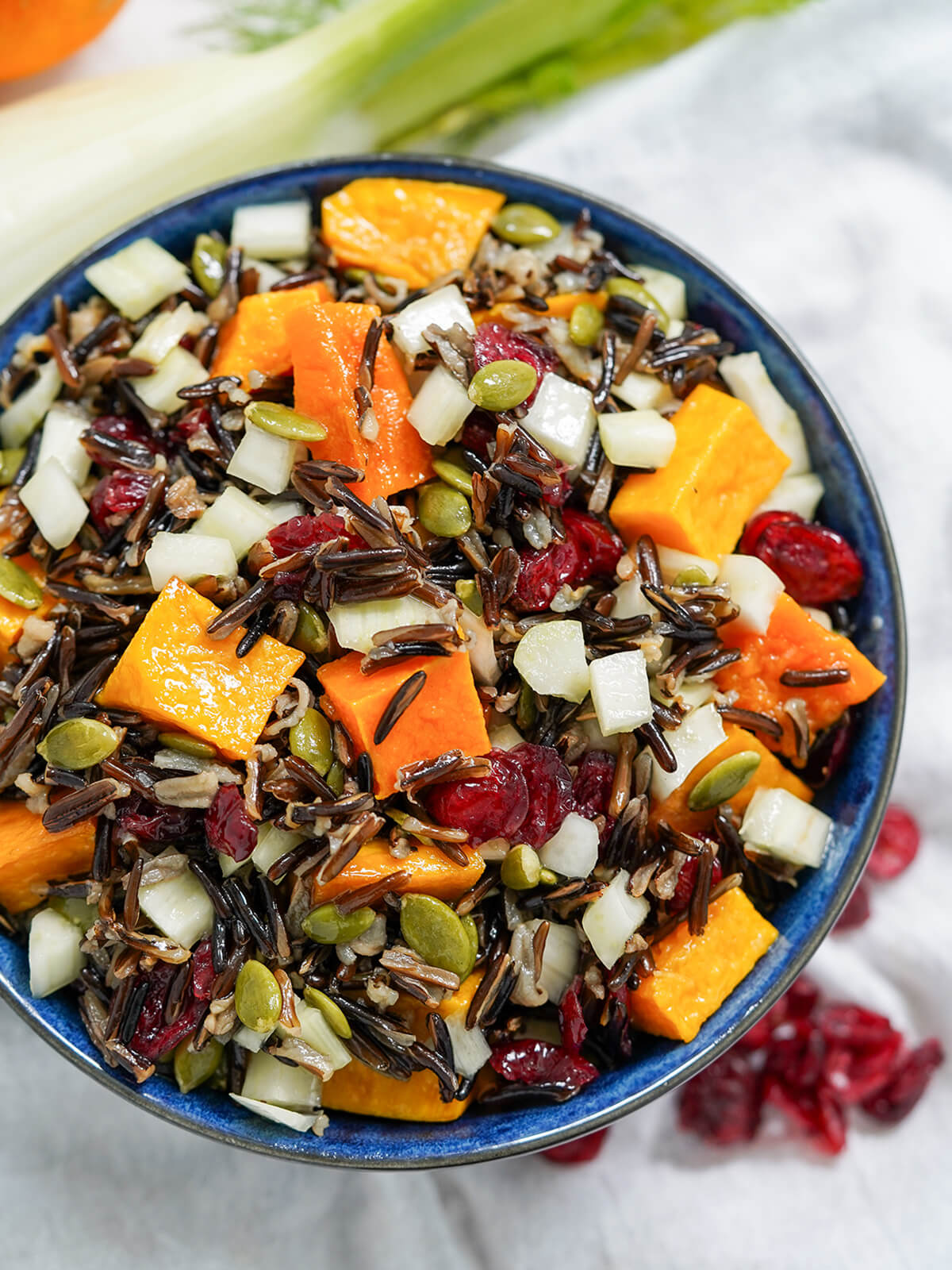 overhead view of bowl of butternut squash wild rice salad.