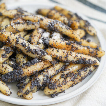 side close up view of plate of Mohnnudeln, poppy seed potato noodles.