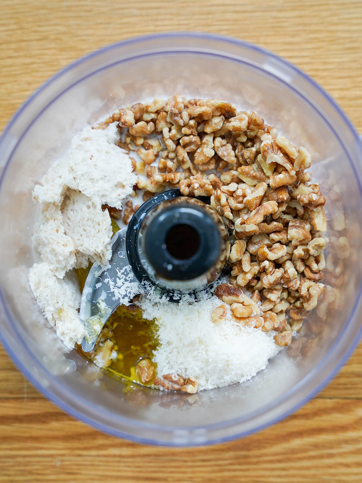 chopped walnuts, grated cheese, olive oil and milk-soaked bread chunks in food processor.
