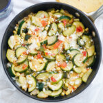 overhead close view of skillet of calabacitas, Mexican zucchini