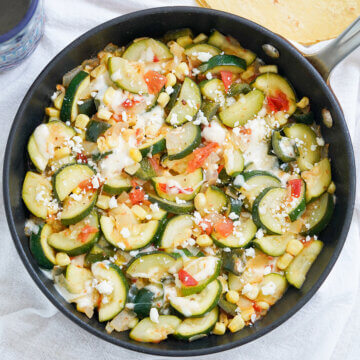 overhead close view of skillet of calabacitas, Mexican zucchini