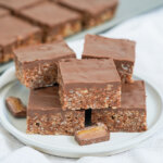 plate of pieces of mars bar slice.
