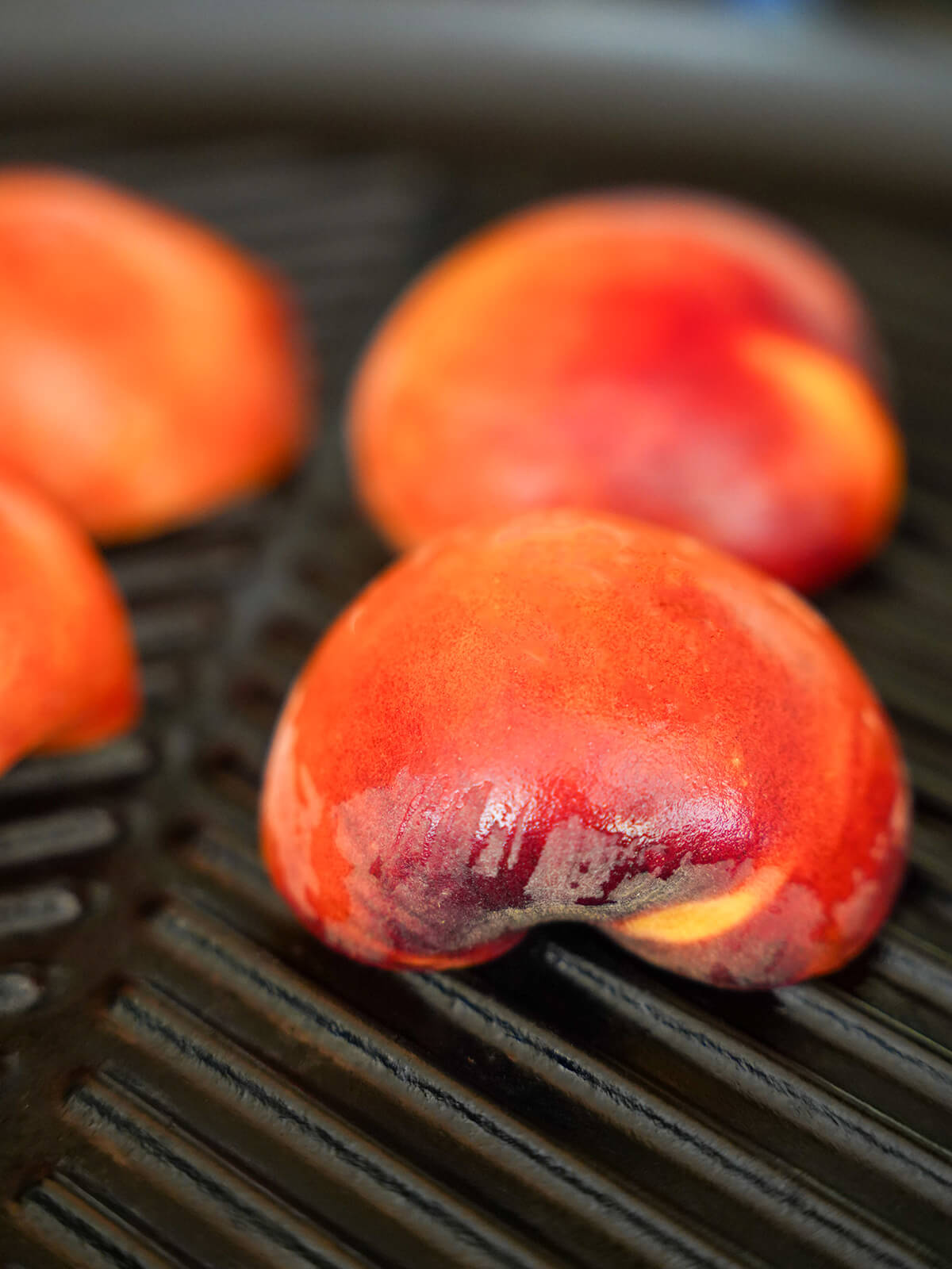 half peaches cut side down on grill pan.