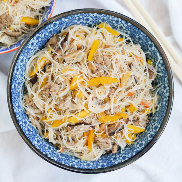 overhead view of bowl of Taiwanese pumpkin rice vermicelli noodles.